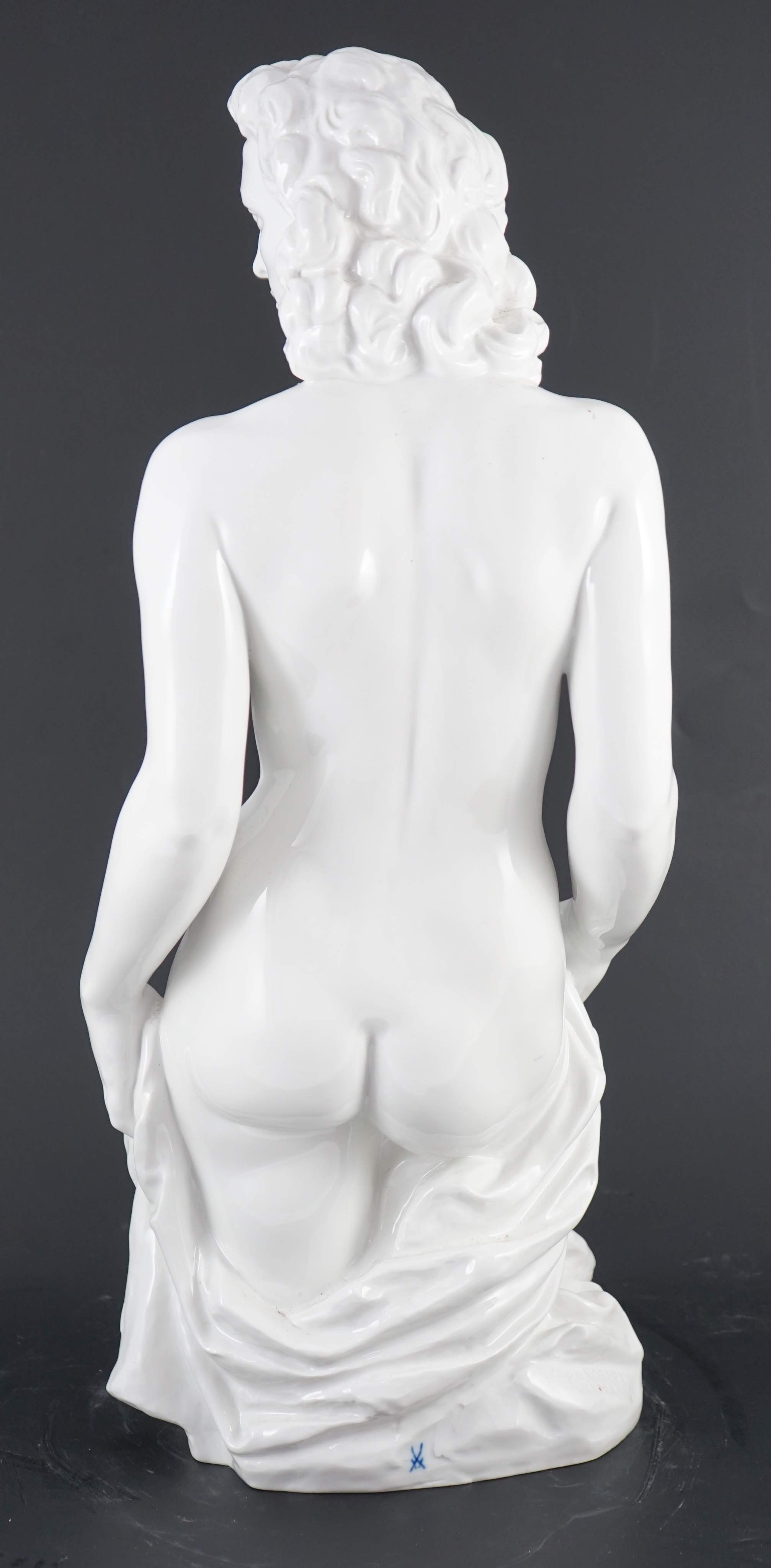 Robert Ullmann (1903-1966) for Meissen, a large white glazed porcelain three-quarter length figure of a nude woman, 50.5cm high